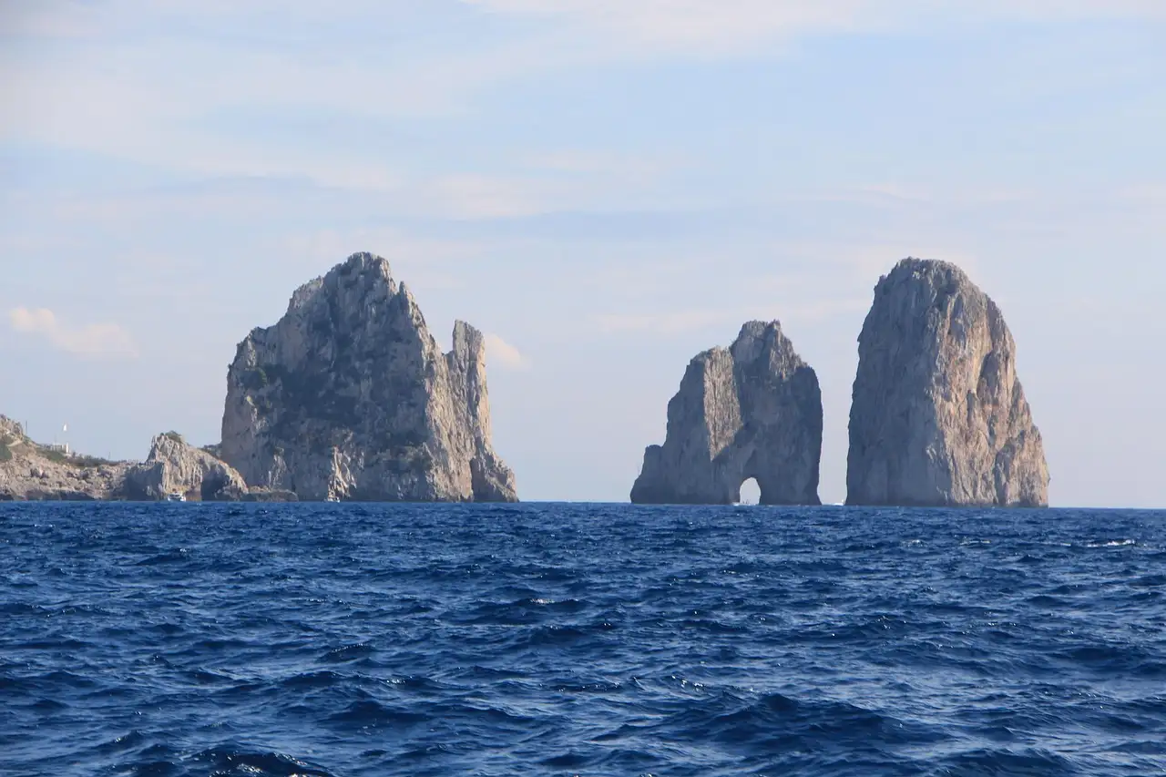 The Faraglioni rocks rising out of the sea off Capri