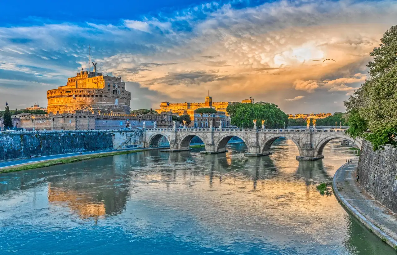 Castel Sant'Angelo and its bridge over the Tiber at sunset