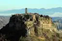 Civita di Bagnoregio on its rock above the valley, with the long footbridge up to it