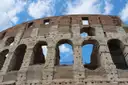 Close view of worn stone arches on the Colosseum