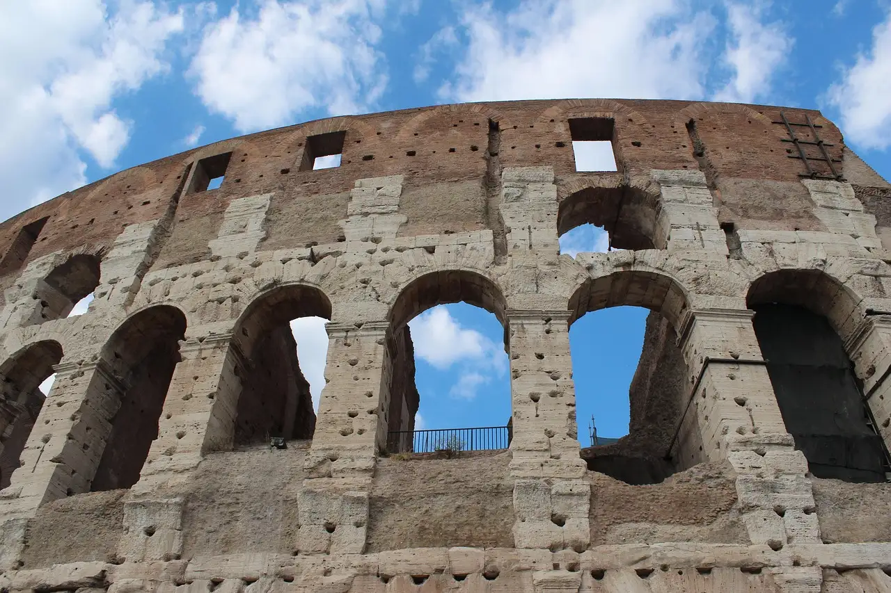 Close view of worn stone arches on the Colosseum