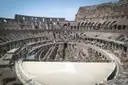 Inside the Colosseum: the rebuilt arena floor and the stone tiers around it