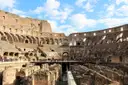 A walkway crossing the open chambers under the Colosseum arena