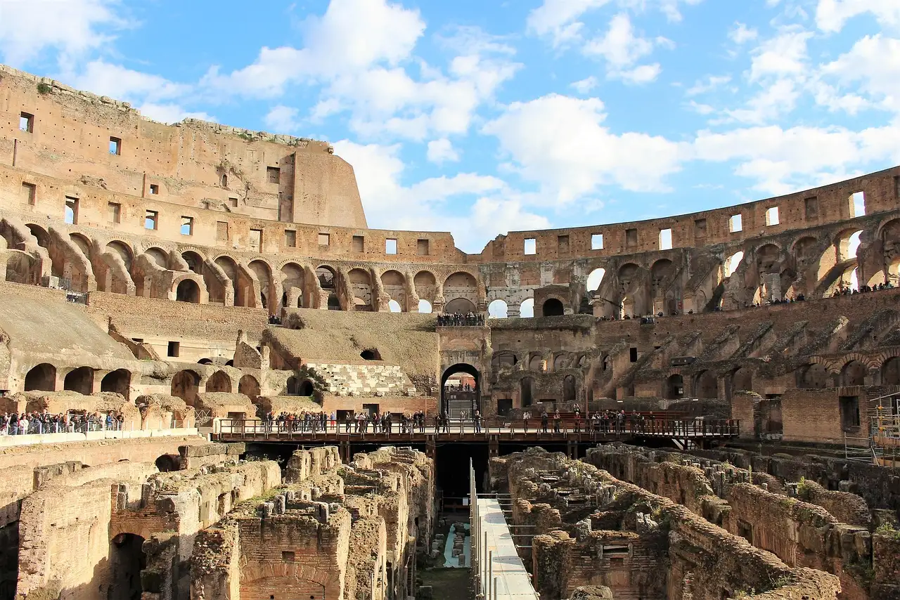 A walkway crossing the open chambers under the Colosseum arena