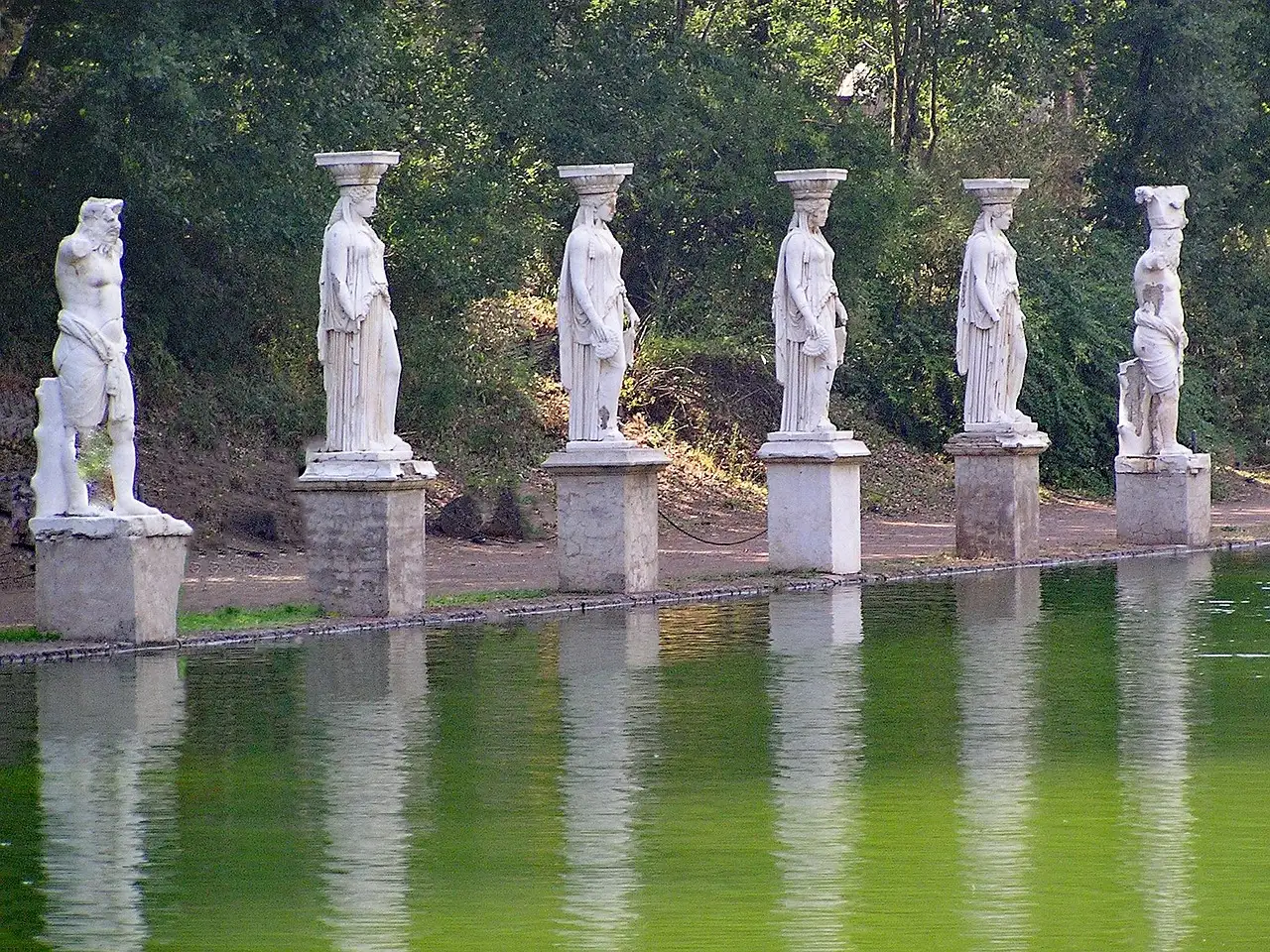 Marble statues along the long pool of the Canopus at Hadrian's Villa
