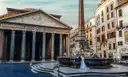 A bride and groom by the fountain in front of the Pantheon at dawn