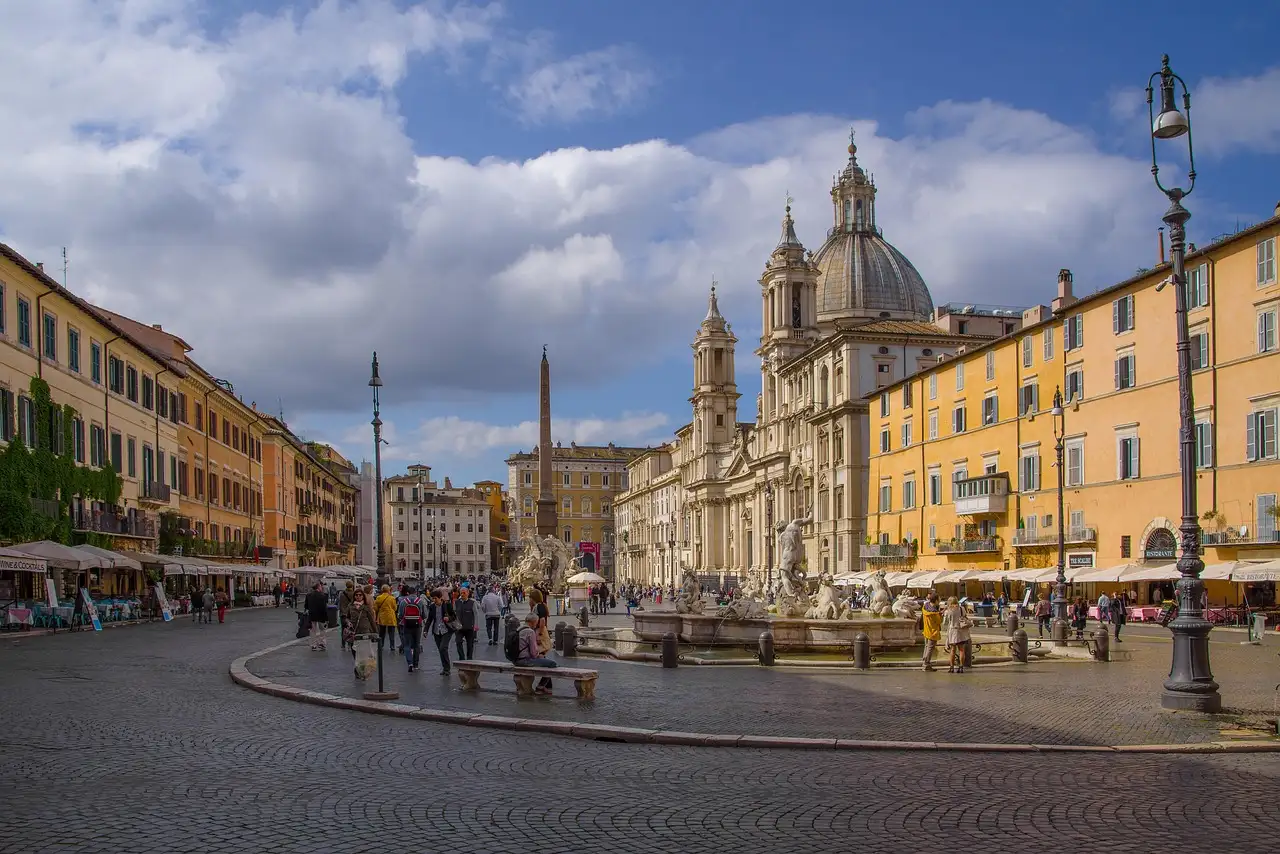 Piazza Navona in Rome with its domed church, fountain and cafés