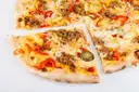 Slices of pizza with olives and peppers on a white surface