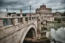 Ponte Sant'Angelo with its lamps and statues, and Castel Sant'Angelo behind