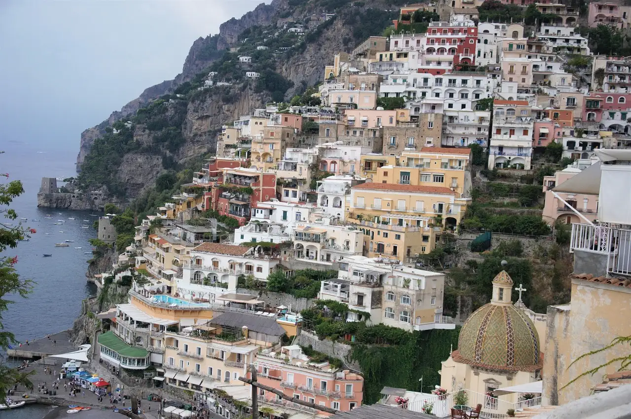 Positano’s pastel houses and church dome above the sea