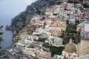 Positano’s pastel houses and church dome above the sea
