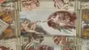 Part of the Sistine Chapel ceiling, with The Creation of Adam in the middle