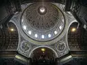 The inside of the dome of St. Peter's Basilica, with light from its windows