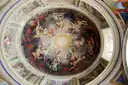 A round painted ceiling in the Vatican Museums